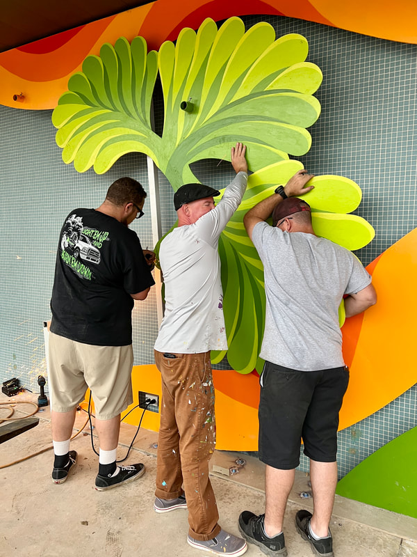 Brandon, Ty, and Wes attaching the 3 large leaves
